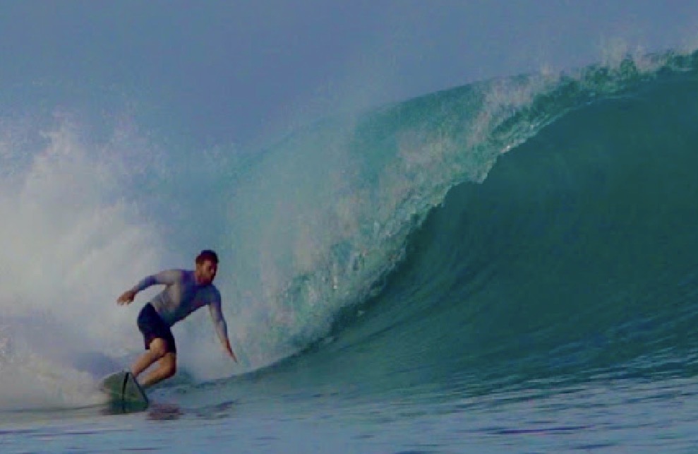 David Fein, PT, DPT, CSC I, surfing a wave